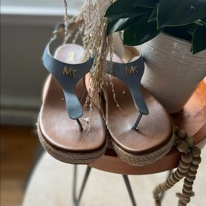 Michael kors heel/slipper it’s light blue with brown.